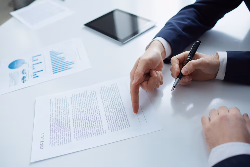 businessman-pointing-contract_1098-3393